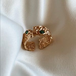 Elegant Gold Textured Ring with Green Accents